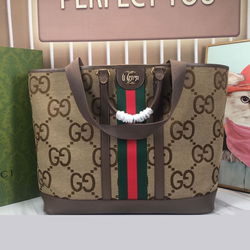 G*u*i shopping bags